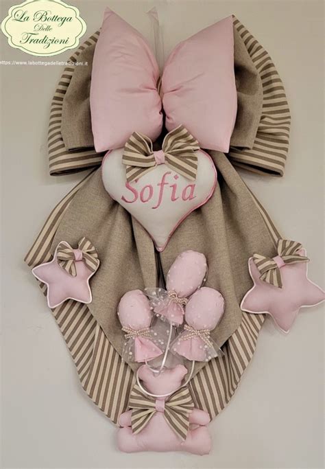 Varietà di fiocchi nascita in tessuto