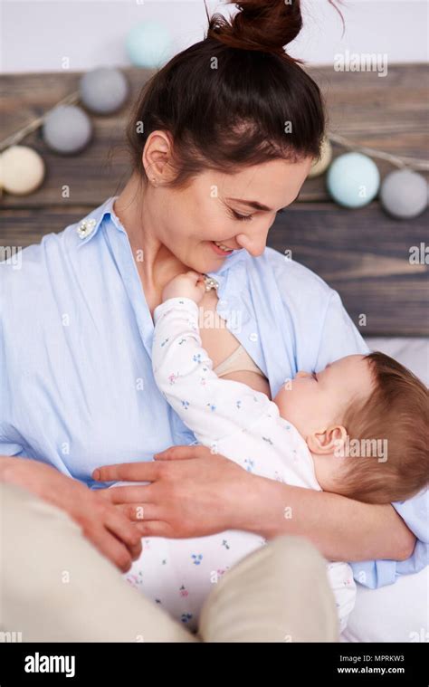 Mother breastfeeding her baby