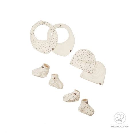 esempio di kit di abbigliamento in cotone biologico per neonato