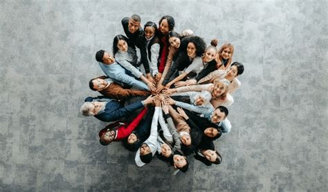 Diverse people from a community engaging in a collaborative project, symbolizing collective effort and radiating influence