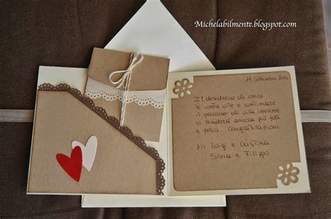 Esempi di biglietti d'auguri fai da te per matrimonio con cuori e anelli