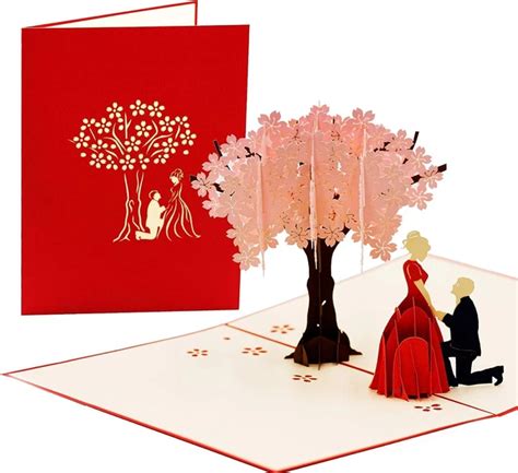 Biglietto di auguri pop-up a forma di culla con elementi decorativi per neonati