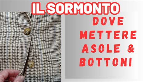 Cardigan neonato finito con asole e bottoni