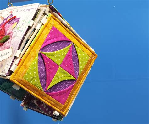 Fase di imbastitura dei quadrati patchwork