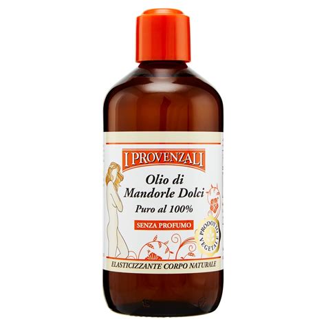 Flacone di olio di mandorle dolci e un pettinino per neonati