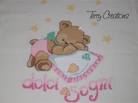 Schemi punto croce per copertine neonato