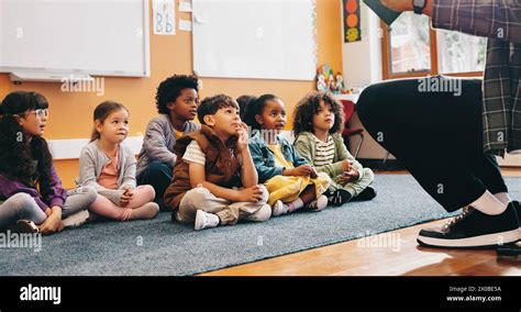 Children listening to stories in a magic circle