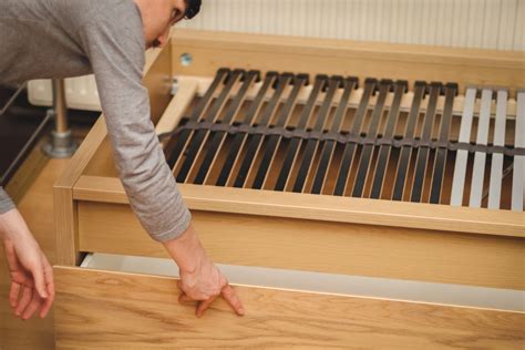 Schema delle diverse altezze della rete del materasso in un lettino regolabile