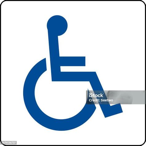 Simbolo di accessibilità su percorso pavimentato