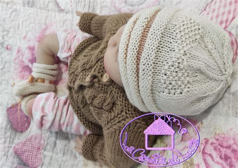 Bambino con completino ai ferri