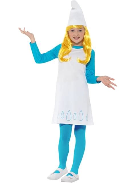 Bambina che indossa un costume da Puffetta in un giardino fiorito