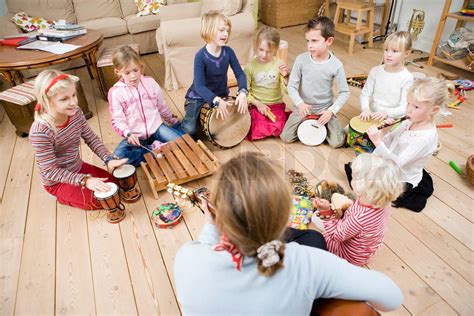 Children playing various musical instruments