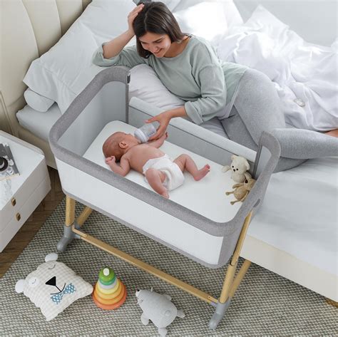 Baby sleeping in bassinet with Welcome Pad