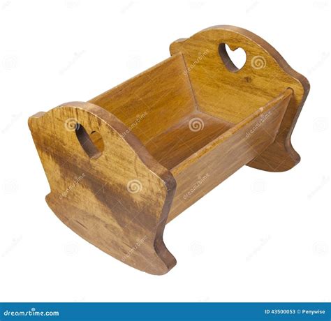 Culla di legno tradizionale con un bambino