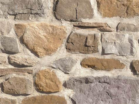 Schermata del puzzle dell'Isola Materna con la pietra triangolare e le sue posizioni