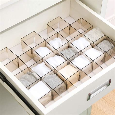 immagine di un cassetto organizzato con separatori per prodotti neonato
