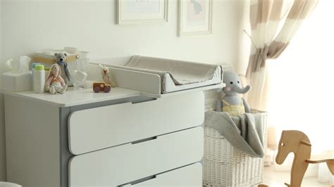 infografica sulle altezze ergonomiche per il fasciatoio