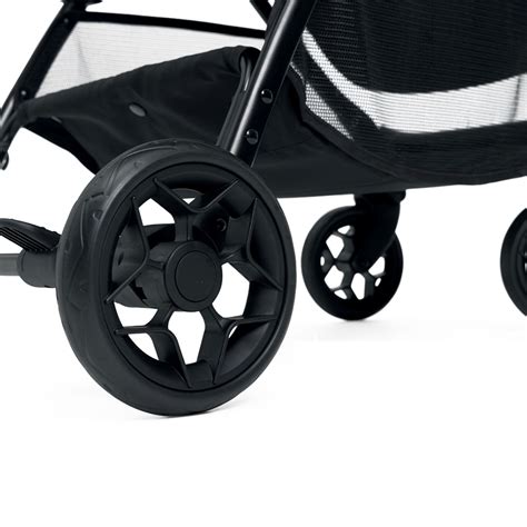 Vista laterale del passeggino Giordani Racer con dettaglio del telaio in acciaio e configurazione a 4 coppie di ruote