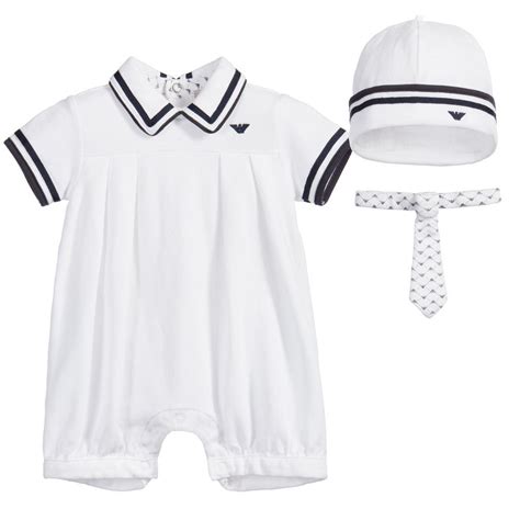 Happy baby wearing Armani Baby romper