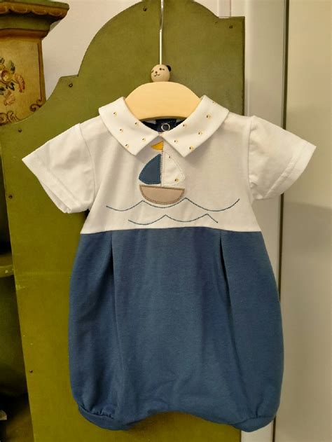 pagliaccetto neonato avorio con ricami