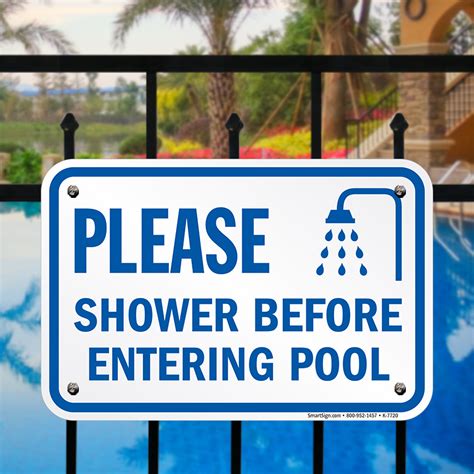Children showering before entering the pool