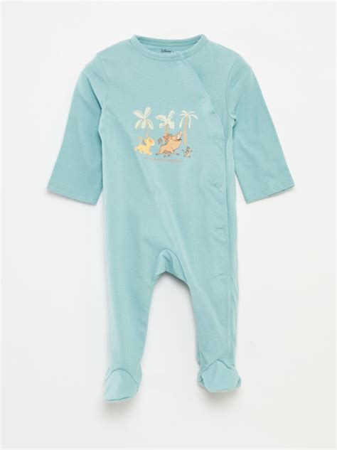 tutina verde con piedini e dettagli ispirati a Dumbo
