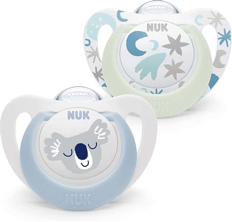 Neoanato che succhia il ciuccio NUK