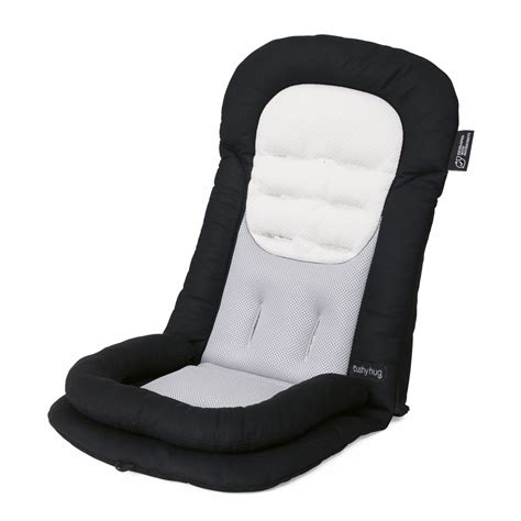 Riduttore ergonomico inserito in un passeggino reclinato
