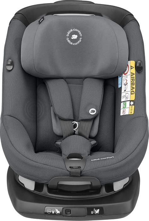 Parent easily adjusting the headrest of a Bebe Confort Titan Pro