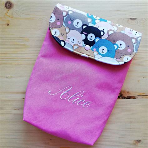 esempio di porta pannolini finito con patta di chiusura decorata