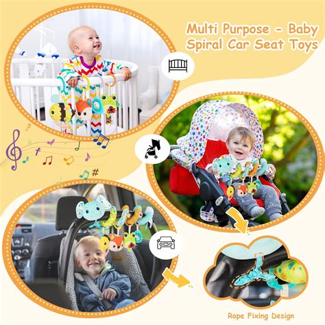 Bambino che interagisce con un gioco da passeggino