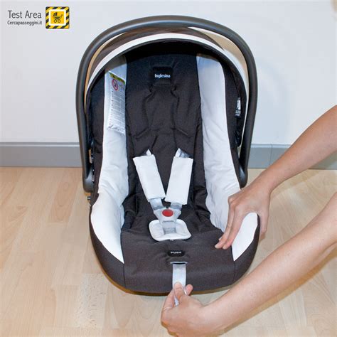 Seggiolino auto Inglesina Huggy Multix su telaio Trilogy