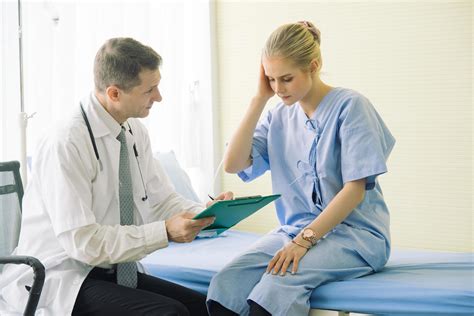 Doctor consulting with patient