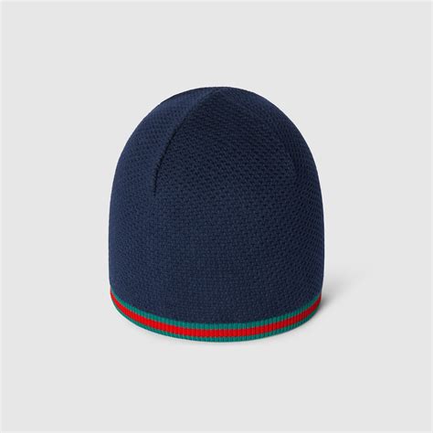 Cappellino neonato Gucci in cotone jacquard con dettaglio logo