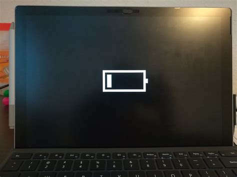 Battery icon on a smartphone screen showing Ally Pad status