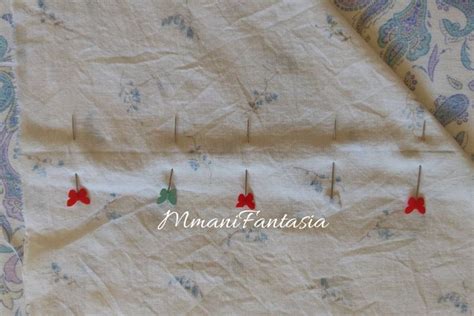 Cucitura angolo lenzuolo con spilli