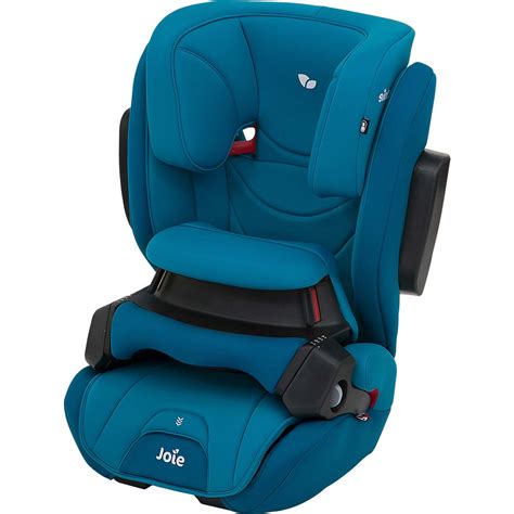 seggiolino auto Joie Traver Shield in un abitacolo moderno
