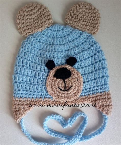 lavorazione uncinetto cappellino neonato