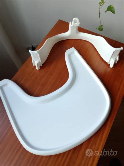 pulizia vassoio seggiolone