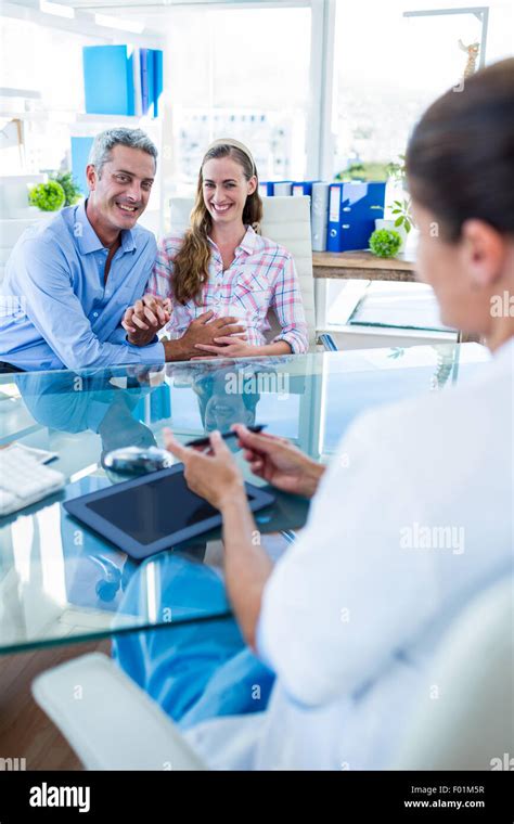 Couple discussing with doctor