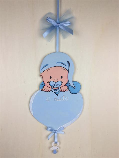 neonato con fiocco azzurro