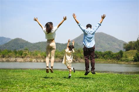 Family enjoying an outdoor event in a city park