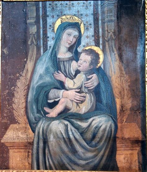 Dettaglio di un’antica raffigurazione di Maria che allatta Gesù