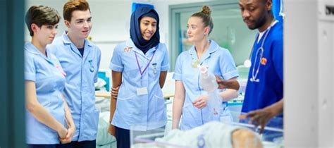 Students learning about midwifery in a university setting