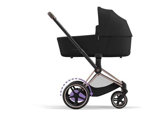 Smartphone screen showing Cybex e-PRIAM app interface with options for rocking, e-power, and battery status