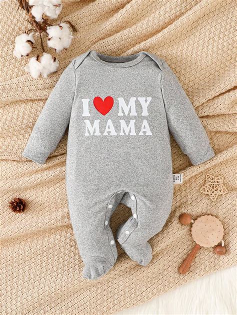 Newborn baby in a comfortable romper