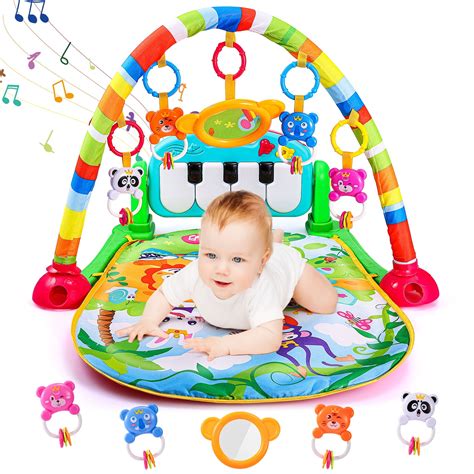 Baby interacting with a play gym