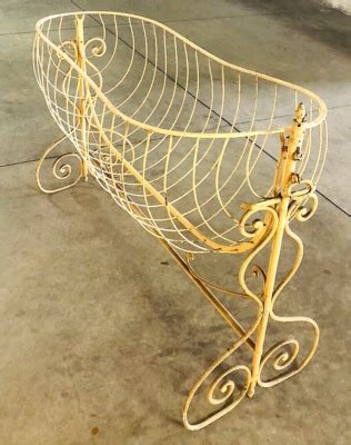 Culla a dondolo in ferro battuto del 1800