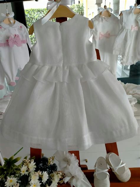 Materiali pregiati per abiti da battesimo: lino e cotone