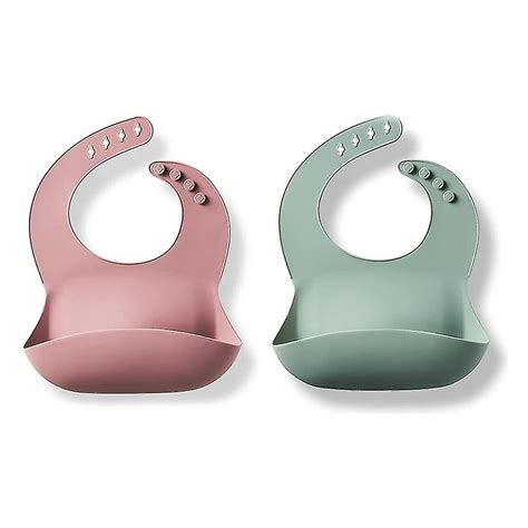 Bavaglini in silicone e in tessuto a confronto